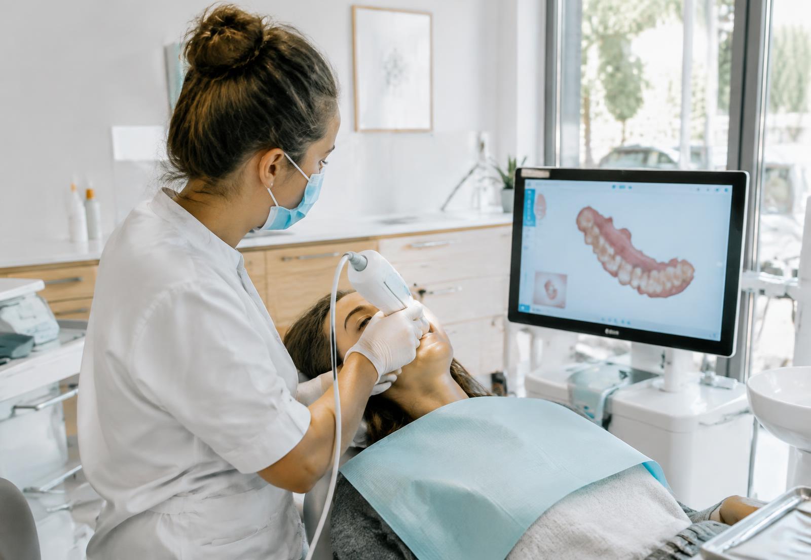 Dentist taking a digital intraoral scan